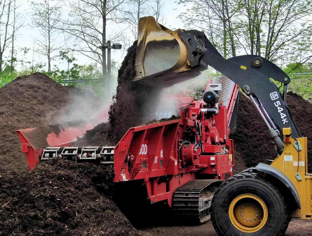 Illustrative wood-chip mulching scene